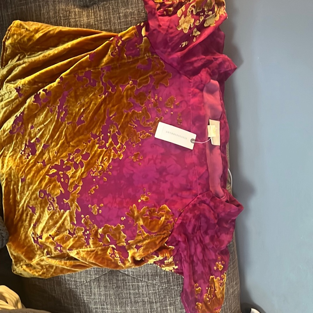 Anthropologie, Mauve top. Never worn in short sleeve , elegant and beautiful NWT